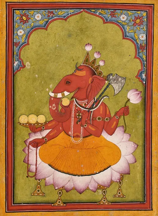 Ganesha mit vier Armen, auf einer Lotusblüte sitzend.